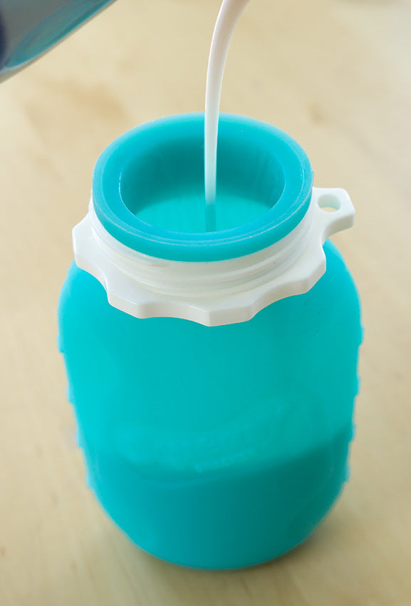 Squeasy Snacker Mini - silikonová kapsička 100ml tyrkysová